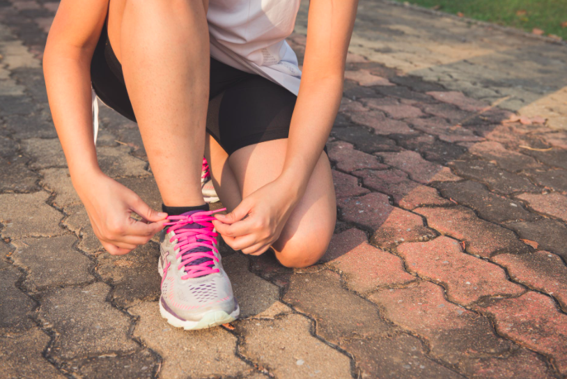 lacing up shoes